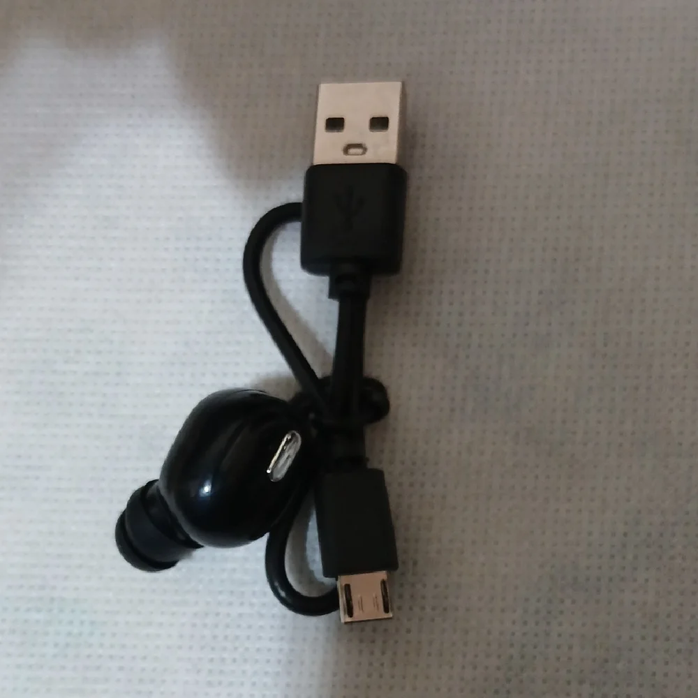 Wireless Black Earbud with USB Charging Cable